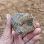 Nickel and cobalt metals stacked in warehouse for battery production and global export – showcasing zinc, tin, nickel, and cobalt trading logistics.