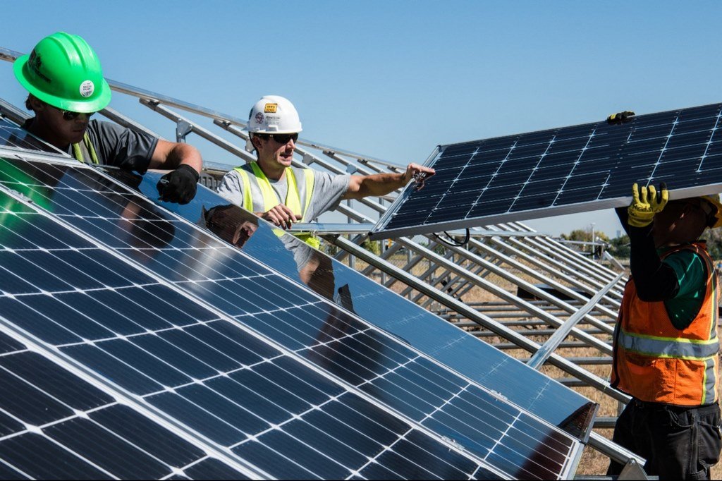 "Off-grid solar development powering remote industrial facility with photovoltaic panels and energy storage."