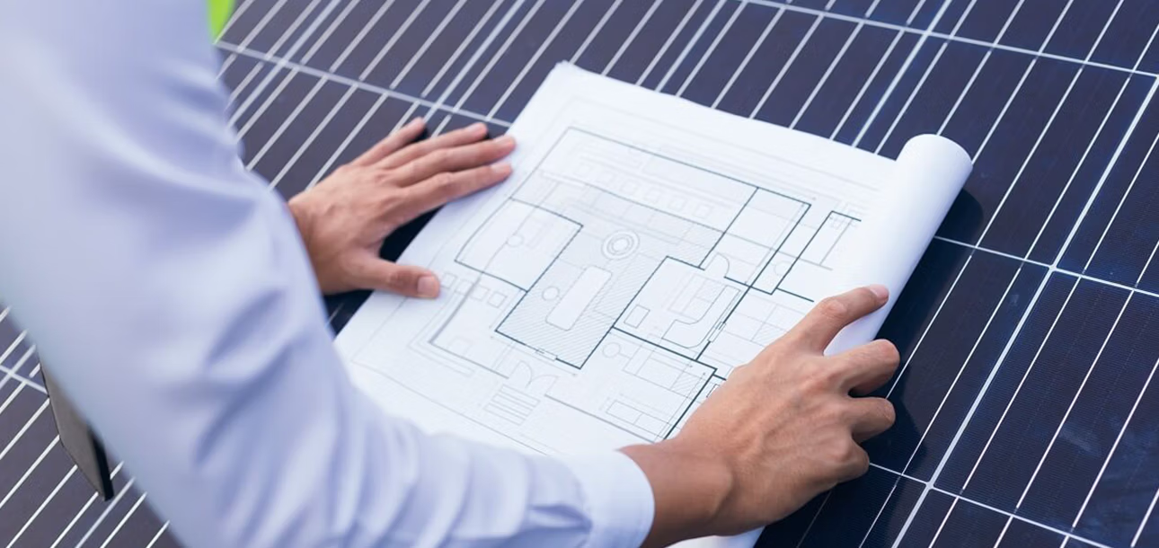 Financial charts and wind turbines symbolizing the economics of renewable energy investment decisions.