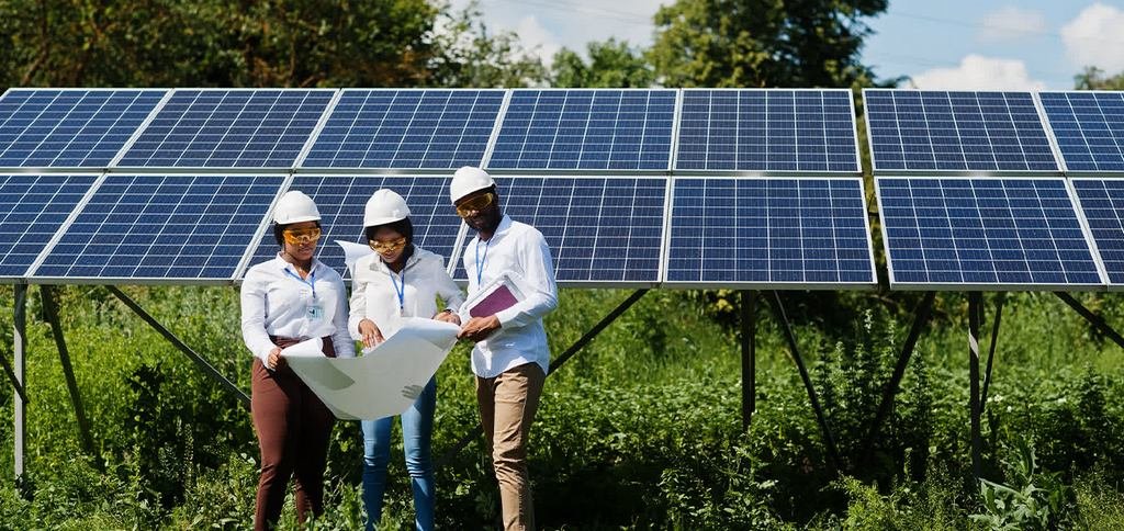 Large solar farm financed by foreign direct investment, showcasing rows of PV panels generating clean energy under the sun.