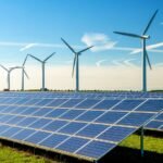 Photovoltaic system installation in an emerging market solar farm with clear skies.