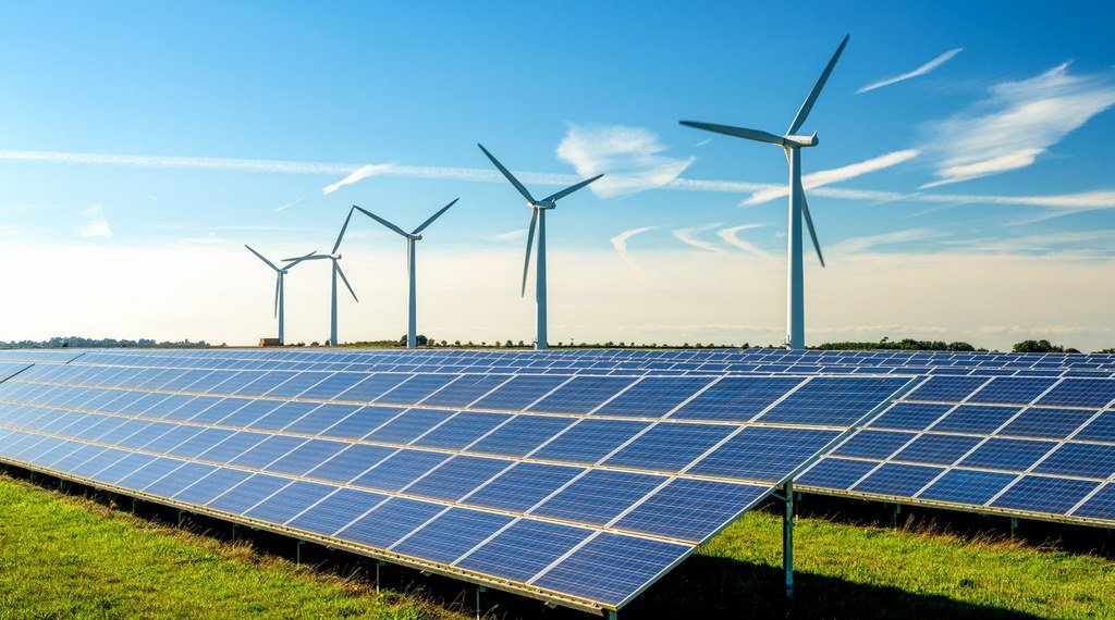 Photovoltaic system installation in an emerging market solar farm with clear skies.