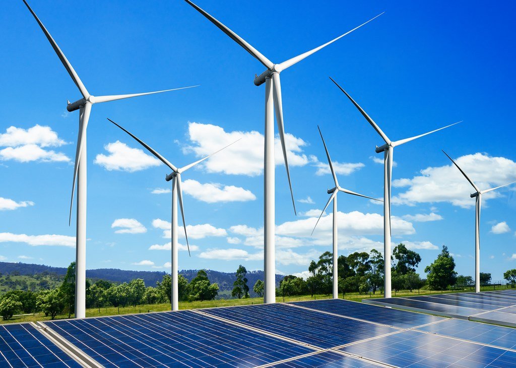 Institutional investor reviewing PV panels integration in a diversified clean energy portfolio.