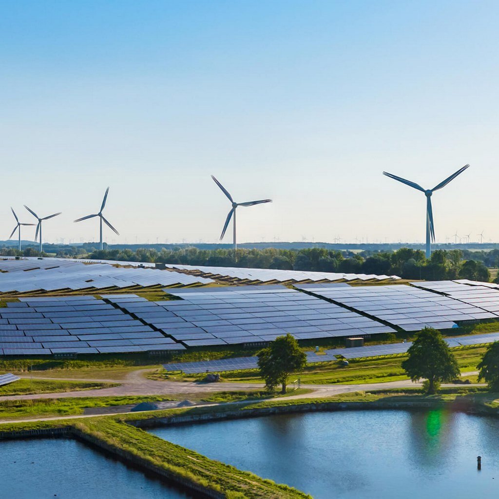 Photovoltaic system installation in an emerging market solar farm with clear skies.